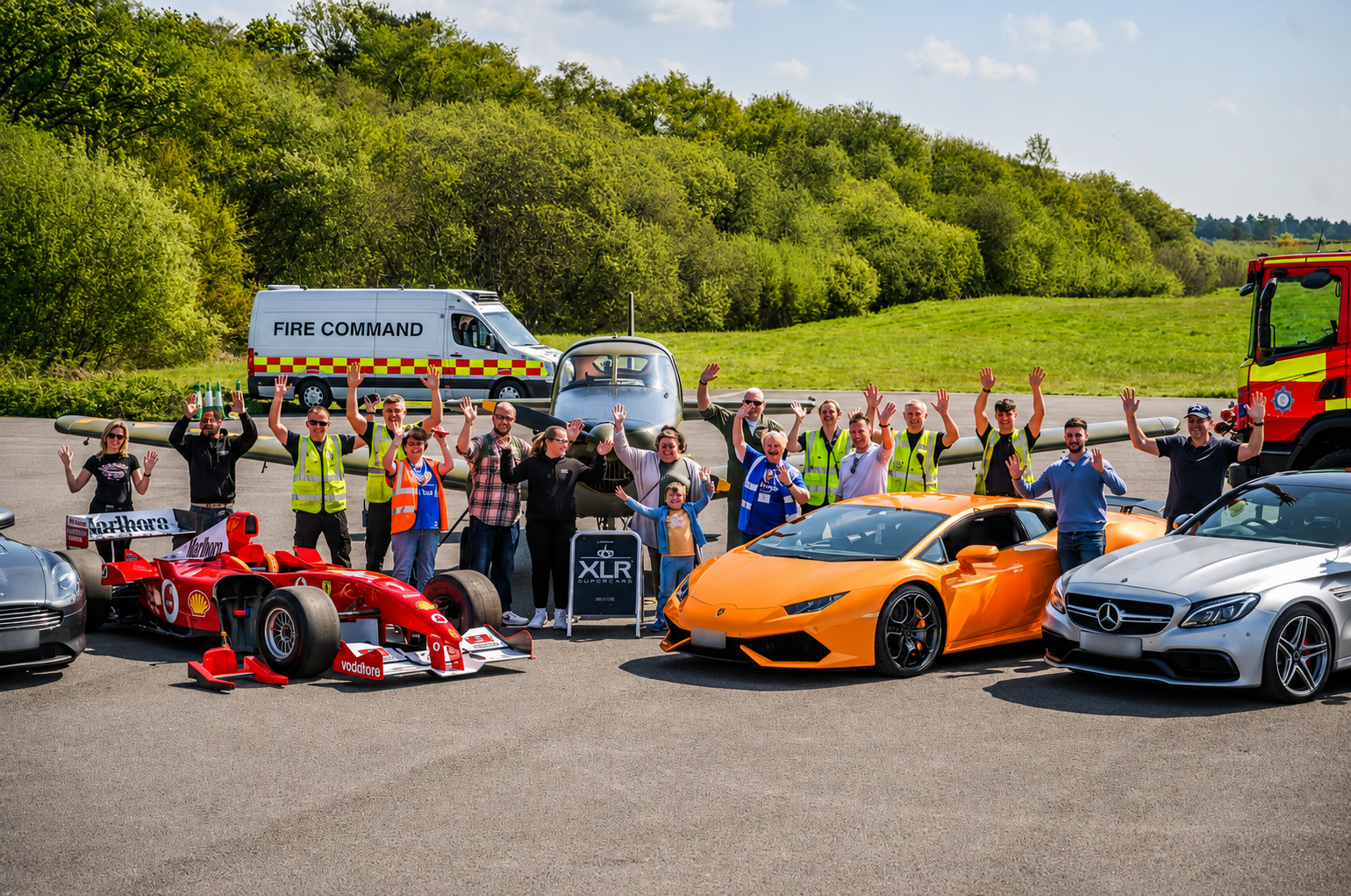 Crowd at Lamborghini Huracan supercar hire event on airfield Dorset