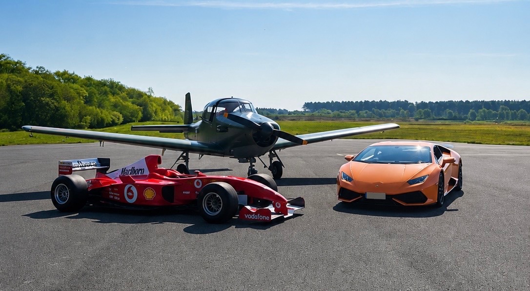 Orange Lamborghini Huracan hire Dorset on airfield alongside an F1 car and plane